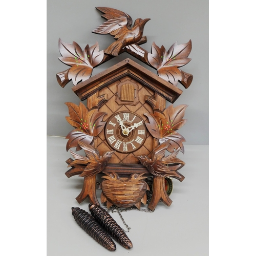 2108 - A German cuckoo clock, a Leonardo Collection The Last of the Mohicans and a barometer with ram's hea... 