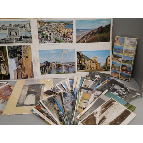 2118 - A collection of postcards dated 1960s and 1970s, an album and loose and match boxes from The Channel... 