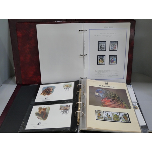 2140 - Two albums first day covers, an album of WWF stamps and an album of Life and Times of HM The Queen M... 