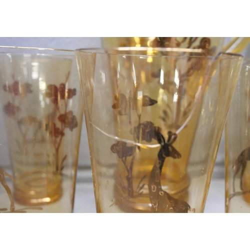 2257 - A set of glasses and a jug with gold leaf design **PLEASE NOTE THIS LOT IS NOT ELIGIBLE FOR IN-HOUSE... 