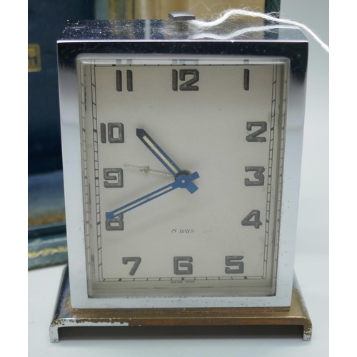 2302 - An Art Deco 8-Day travelling timepiece, in fitted case marked Harrods, London, S.W.1.