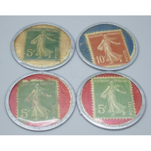 2303 - Four French 1920 Business Tokens, aluminium capsules with postage stamp held by a mica disc