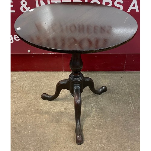 116 - A George III mahogany circular tilt top tripod tea table