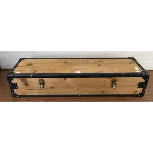 190 - A pine cased croquet set with two golf putters and balls