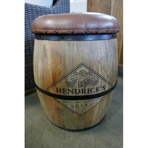 3027 - A mango wood barrel shaped storage stool bearing Hendricks Gin inscription