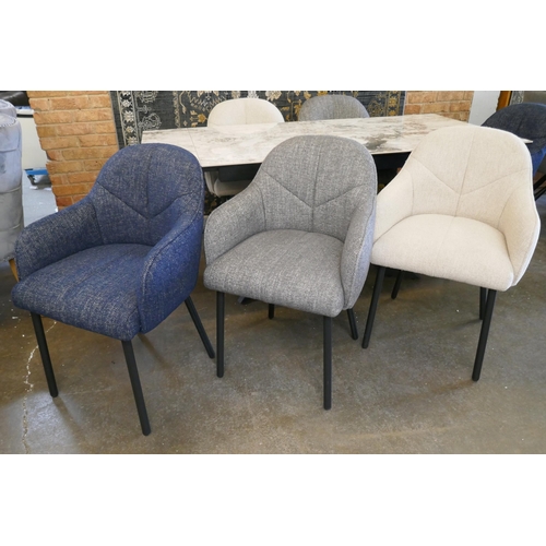 3042 - A Kos extending dining table and a harlequin set of six fabric upholstered dining chairs *This lot i... 