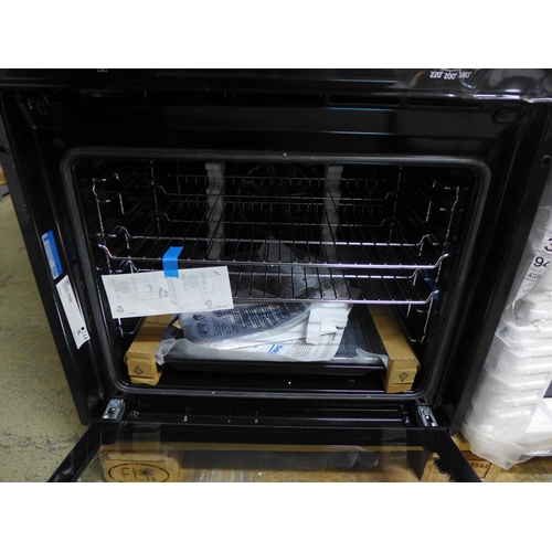 4196 - Beko built in oven (Door needs attention/transit damage) *This lot is subject to VAT