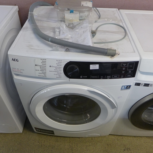 4254 - AEG Washer / Dryer 9Kg    - This lot requires a UK adapter  *This lot is subject to Vat