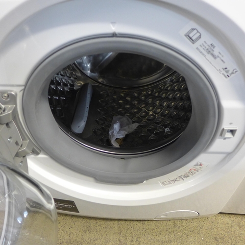 4254 - AEG Washer / Dryer 9Kg    - This lot requires a UK adapter  *This lot is subject to Vat