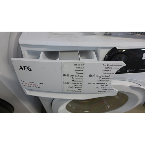 4254 - AEG Washer / Dryer 9Kg    - This lot requires a UK adapter  *This lot is subject to Vat