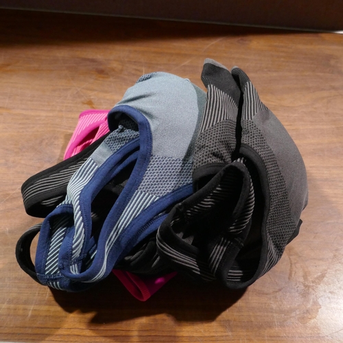 6170 - A quantity of Puma sports bras and a pair of Weatherproof Grey sneaker boots, Size UK10 *This lot is... 