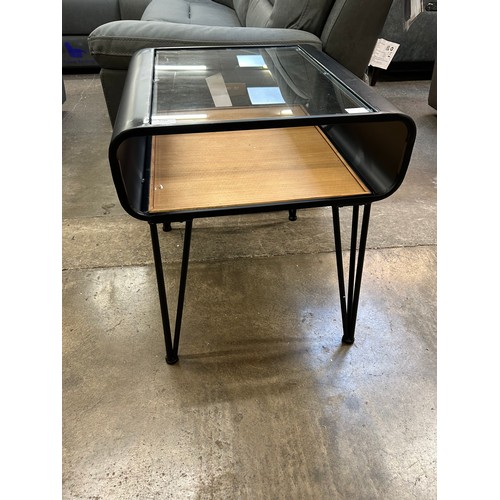 3189 - An industrial style metal and glass topped side table