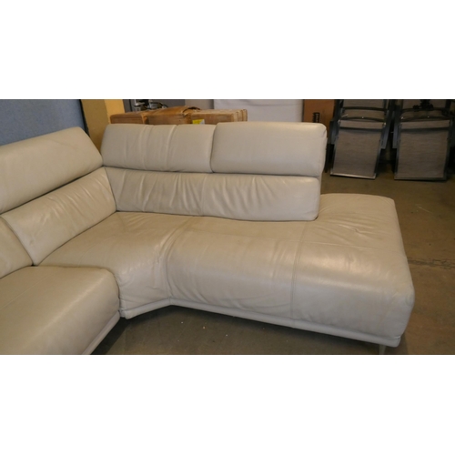 3265 - A cream leather upholstered sectional corner sofa with power headrests - (transit marks), Original R... 