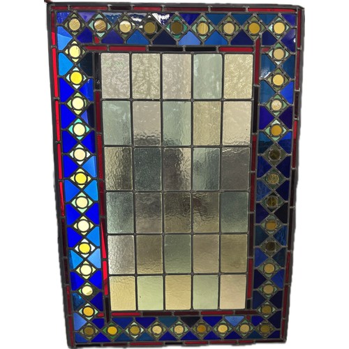 9061 - Four Medieval style leaded stained glass panels, 113 x 79cms, 86 x 86cms, 128 x 80cms