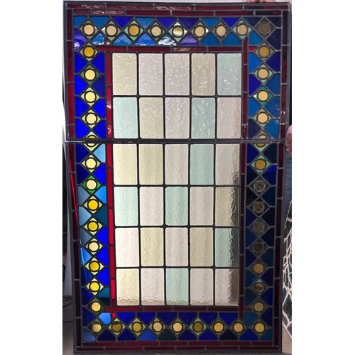 9061 - Four Medieval style leaded stained glass panels, 113 x 79cms, 86 x 86cms, 128 x 80cms