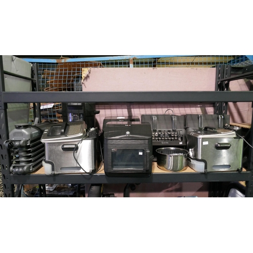 6488 - Quantity of scrap including Sur La Table Air Fryers, Panasonic Solo Black Microwave, Instant Pot Air... 