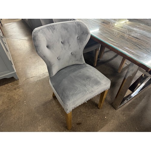 3161 - A Chennai 220cm dining table and six velvet dining chairs *This lot is subject to VAT