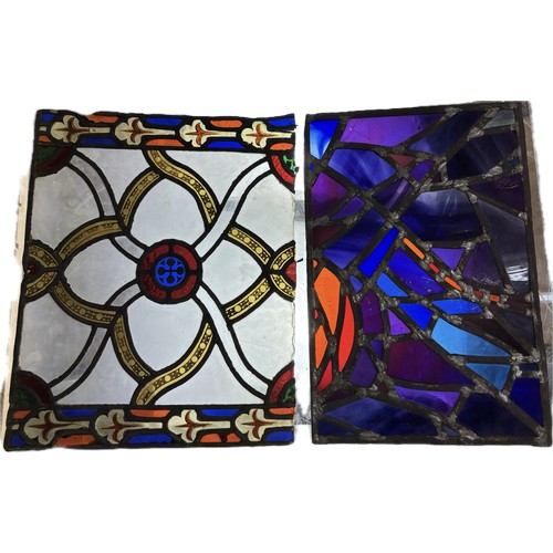 9067 - A large quantity of assorted leaded stained glass panels