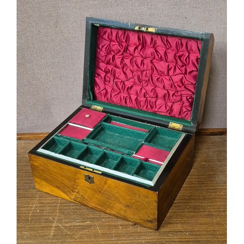 218 - A Victorian walnut lady's fitted jewellery box