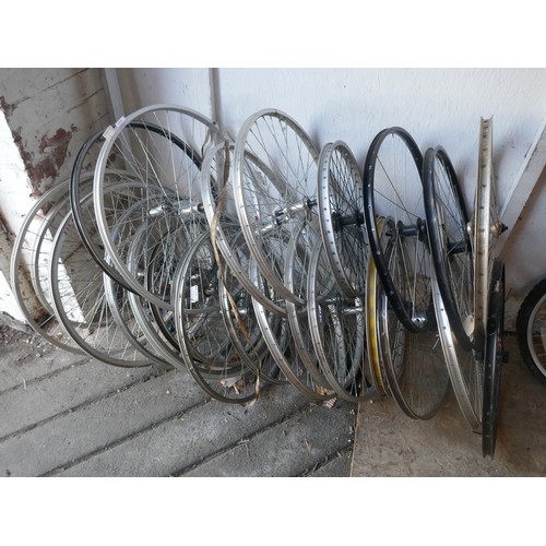 5301 - A quantity of assorted spare frames, forks handle bars and a large quantity of assorted spare bicycl... 