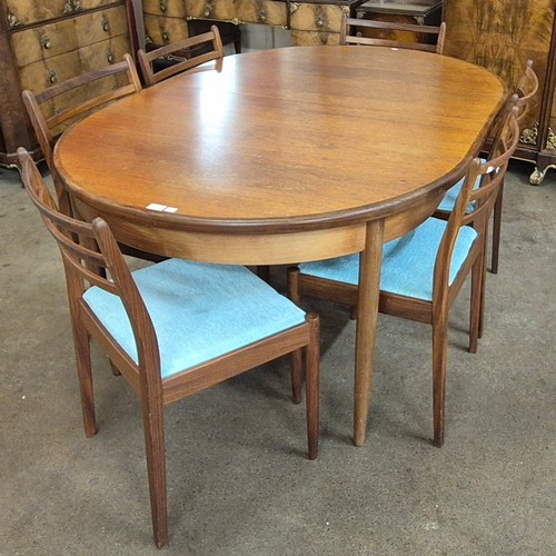 4 - A G-Plan Fresco teak oval extending dining table and six chairs