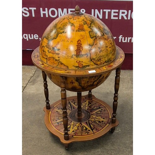 18 - An Italian style terrestrial globe cocktail cabinet/trolley