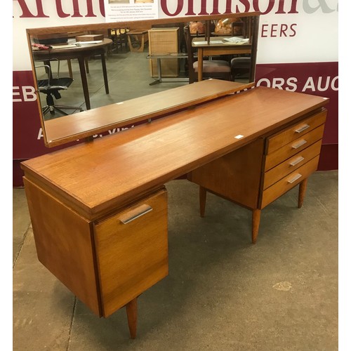 33 - A White & Newton teak dressing table