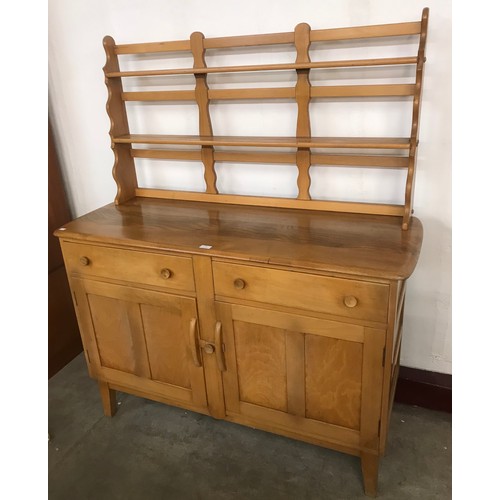 36 - An Ercol Blonde elm and beech Windsor dresser