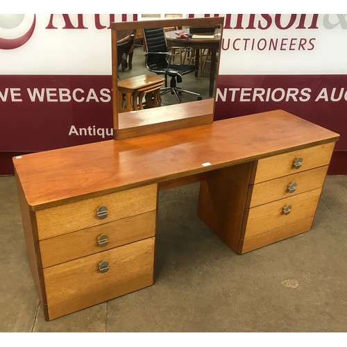 39 - A Stag Cantata teak dressing table, designed by John and Sylvia Reid