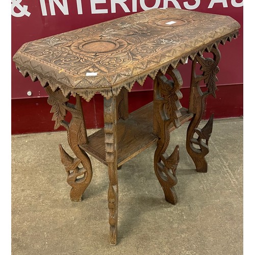 80 - An early 20th Century Eastern carved hardwood occasional table