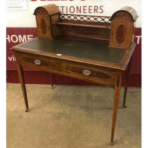 65 - An Edward VII inlaid mahogany lady's two drawer writing table