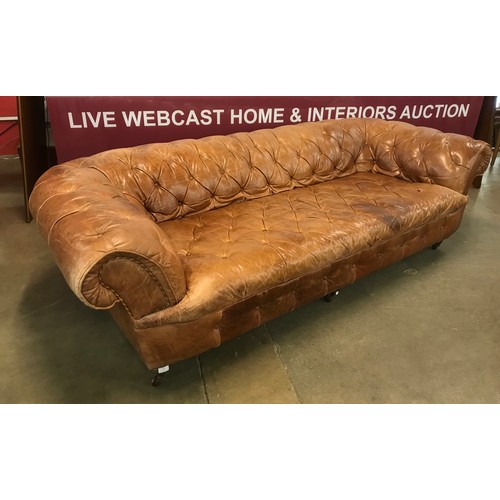 72 - A Victorian style brown leather Chesterfield settee