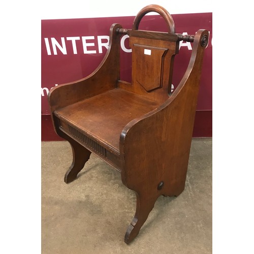 79 - A Victorian mahogany hall seat