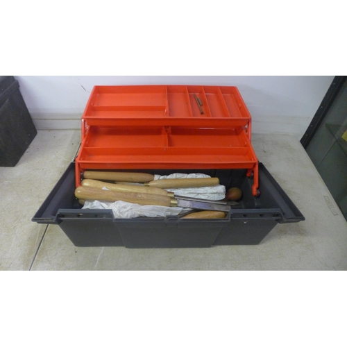 5017 - Three plastic toolboxes containing an assortment of handtools including a good selection of wood tur... 