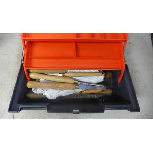 5017 - Three plastic toolboxes containing an assortment of handtools including a good selection of wood tur... 