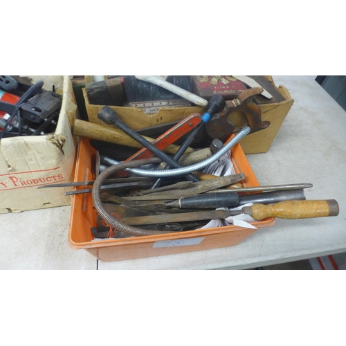 5020 - A large quantity of assorted tools including chisels, hammers, stiff bristled brushes, pasting brush... 