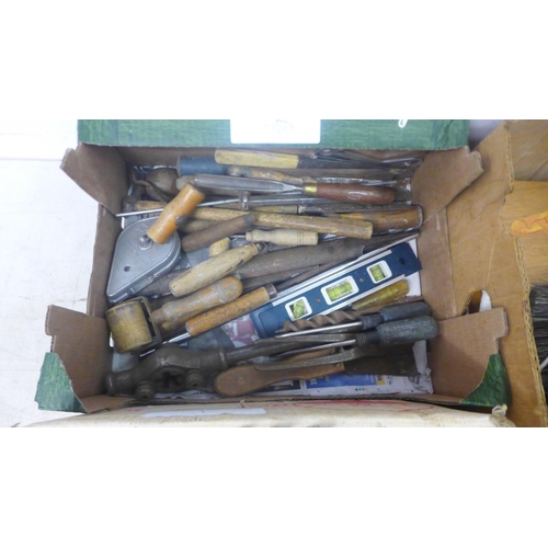 5020 - A large quantity of assorted tools including chisels, hammers, stiff bristled brushes, pasting brush... 