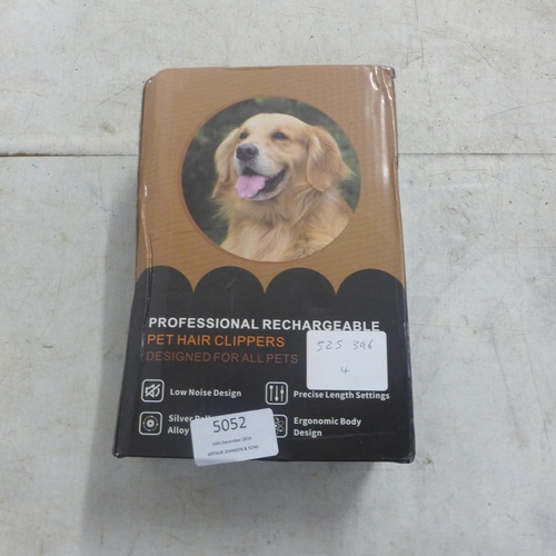 5052 - A quantity of dog items including rechargeable pet hair clippers, Doglemi onsie, harnesses and leads