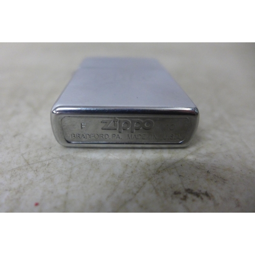 5115A - A Zippo lighter marked 