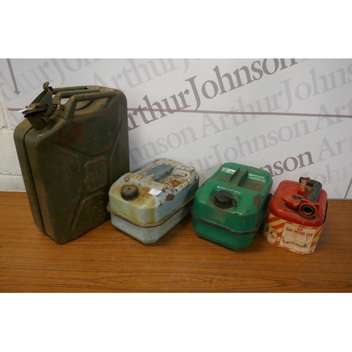 5313 - A green metal Jerry can and 3 assorted metal petrol cans