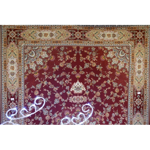 3066 - A fine woven Iranian full pile carpet with a traditional floral design, 300cm x 200cm