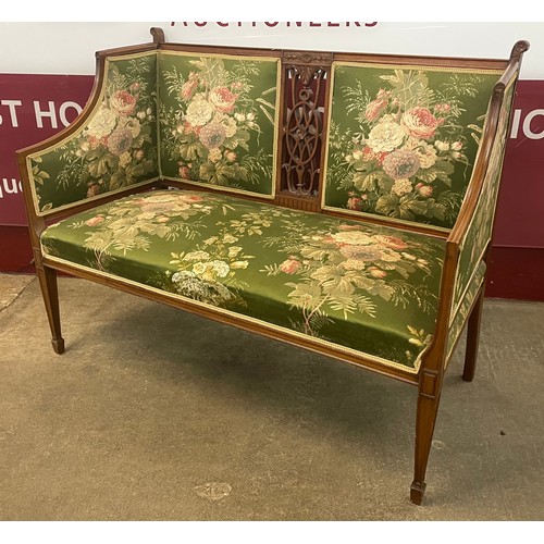 83 - An Edward VII inlaid mahogany and floral fabric upholstered salon settee