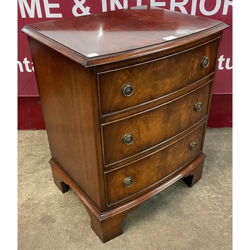 117 - A George III style mahogany bowfront bedside chest