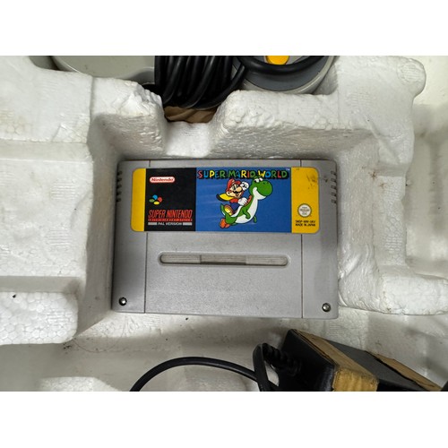 5117 - A Super Nintendo entertainment system with original box, power cable, wired controller and Super Mar... 