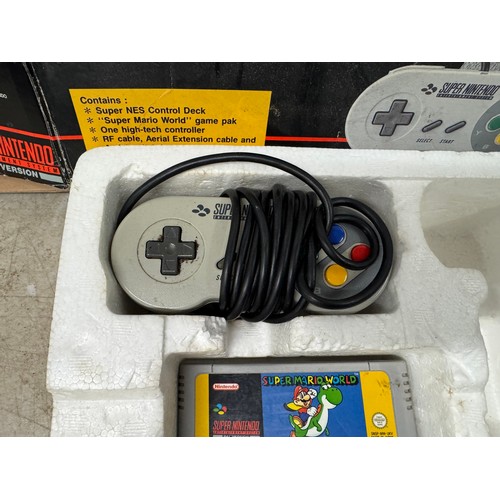 5117 - A Super Nintendo entertainment system with original box, power cable, wired controller and Super Mar... 