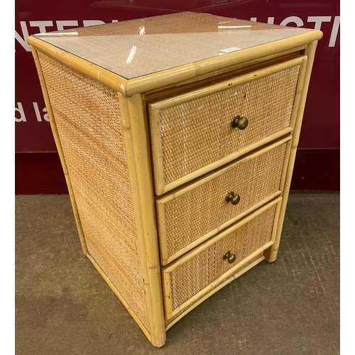 21 - An Italian style bamboo and rattan chest of drawers