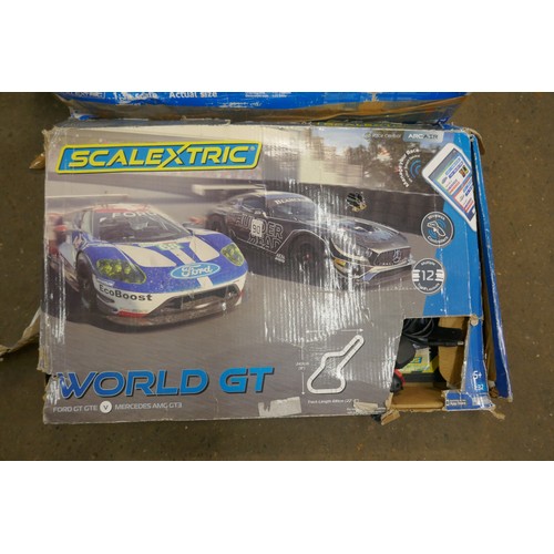 5325 - 2 boxed Scalextric sets and a box of spare parts