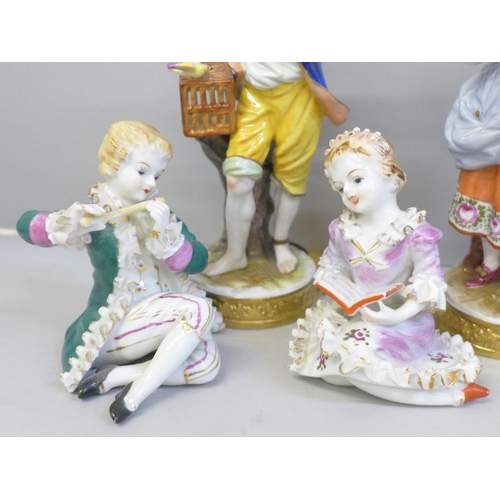 2004 - A collection of German porcelain figures; a pair of Jaffe Rose figures, lady with flowers, man with ... 