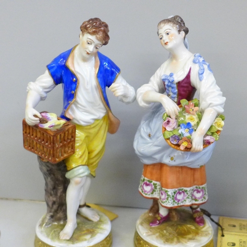 2004 - A collection of German porcelain figures; a pair of Jaffe Rose figures, lady with flowers, man with ... 