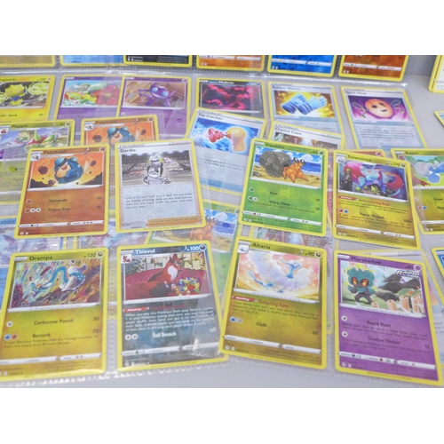 2031 - Over 270 Evolving Skies Pokémon cards including over 50 holographic in protective wallets with some ... 